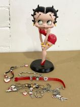 A collection of Betty Boop jewellery and a Betty Boop figure. 22cm