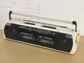 A vintage Sharp radio cassette player. Model WQ-268E (W)