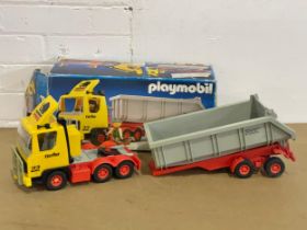 A Playmobil truck in box. 40cm