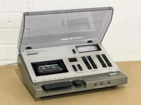 A vintage Aiwa Solid Automatic Stereo Cassette Deck. Model Ad-1250.