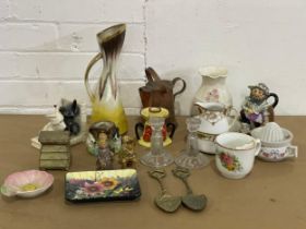 A sundry lot of pottery. Victorian moustache cup, 4 Wade figures, Belleek vase, Carlton Ware dish,
