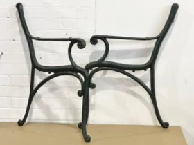 A pair of cast iron garden bench ends. 59x80cm