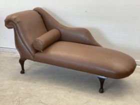 A faux leather chaise lounge. 180cm