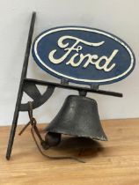 A cast iron Ford wall hanging bell. 33cm