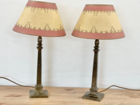 A pair of Laura Ashley brass table lamps. 54cm
