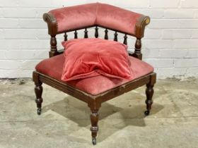 A vintage Edwardian style corner chair.