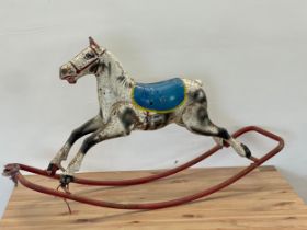 A vintage Triang child’s alloy rocking horse. 113cm