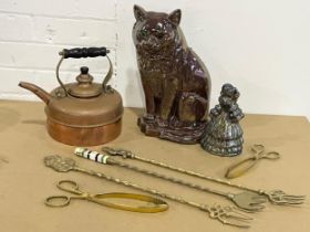 A sundry lot. A vintage cast iron cat door stop/companion set with glass eyes 33cm. A copper kettle,
