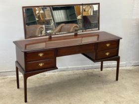 A Stag dressing table. 153x47x118cm