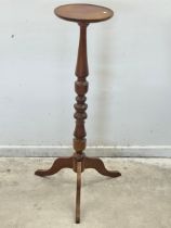 A tall mahogany plantstand torchiere 100.5cm