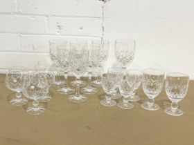 A quantity of crystal drinking glasses.