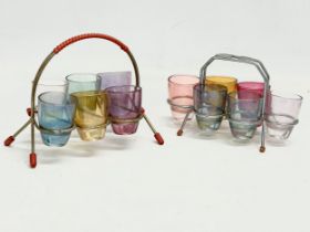 2 sets of 1960’s multicoloured shot glasses on stands.