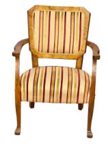 An early 20th century continental walnut armchair.