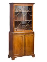 A small proportioned late 19th century George III style mahogany bookcase on bracket feet. Circa