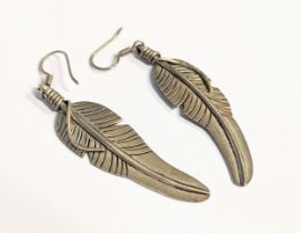 A pair of silver earrings