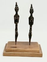 A pair of African bronze Edan Staffs figures on stand. 20x13x26cm