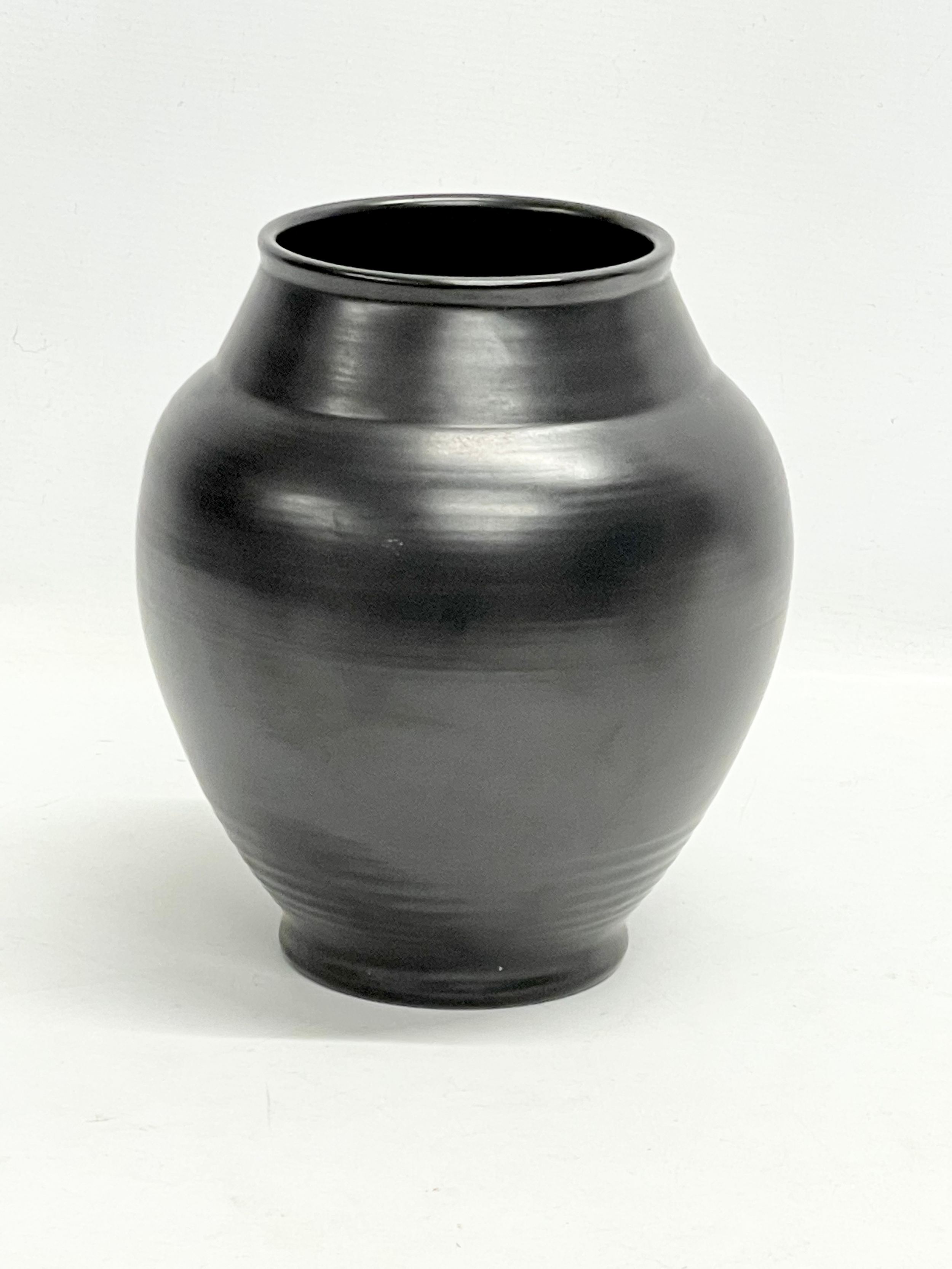 A 1930’s Pilkington's Royal Lancastrian black glazed vase. 20x23cm - Image 3 of 5