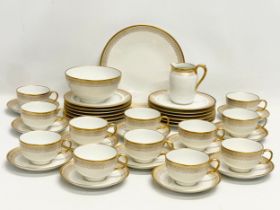 A 39 piece William Guérin Limoges early 20th century gilt porcelain tea set. Circa 1920-1932.