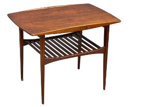 A Danish Mid Century teak coffee table designed by Tove & Edvard Kindt Larsen for France & Son.