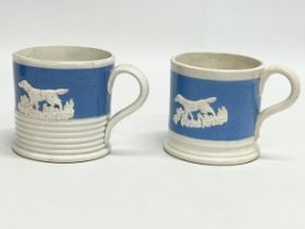 A pair of early to mid 19th century mugs. 10x7cm