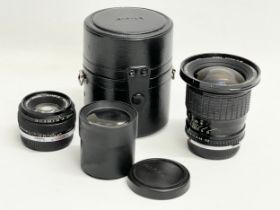 A collection of vintage camera lenses.