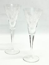 A pair of Waterford Crystal ‘Millennium’ champagne glasses. 23.5cm