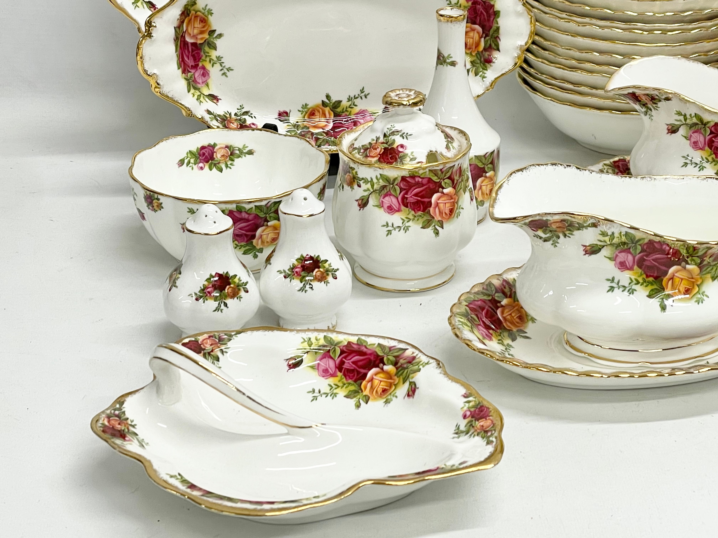 43 pieces of Royal Albert ‘Old Country Roses’ tea and dinner ware. A pair of gravy boats with - Image 3 of 8
