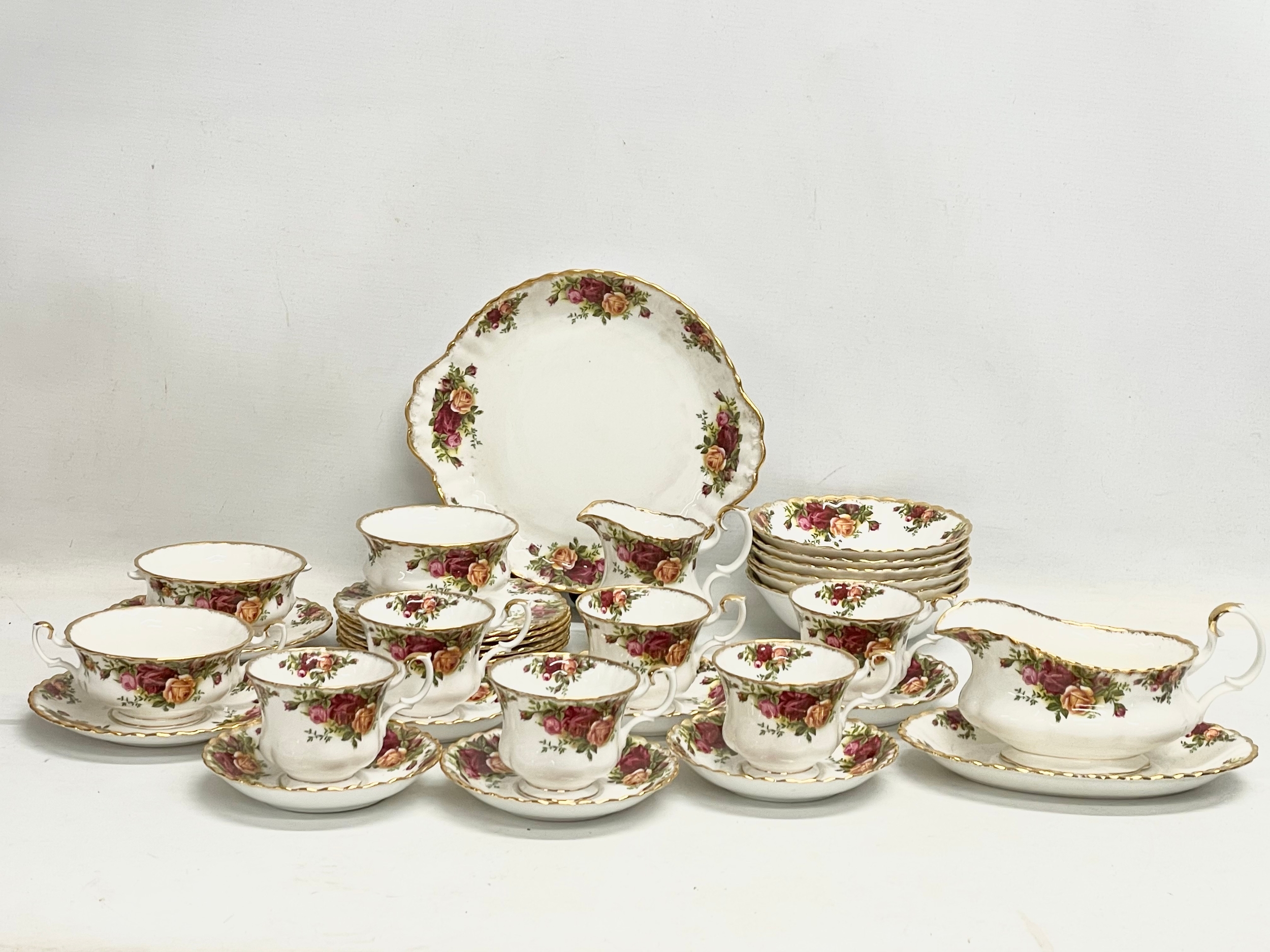 33 pieces of Royal Albert ‘Old Country Roses’ cake plate, 6 soup bowls, gravy boat and saucer.