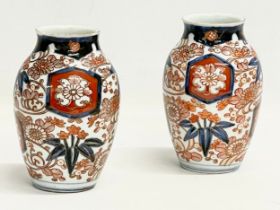 A pair of late 19th century Japanese Imari pattern vases. Makers stamp on bottom. 10x15cm