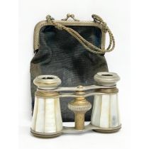 A pair of vintage Mother of Pearl opera glasses and case.