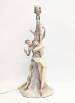 A large Lladro porcelain 'Harlequin Colombine' figurine lamp. 44cm