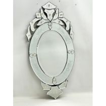 A Venetian style mirror from Laura Ashley. 40x78cm