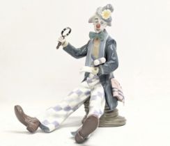 A large Lladro porcelain 'Checking The Time' figurine. 5762. 25cm