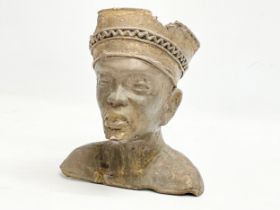 A late 19th/early 20th century African bronze bust. 16x14x20cm