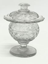 An Irish Regency period early 19th century glass jar with with lid. Circa 1810-1820. 11x15cm