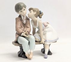 A Lladro porcelain 'Ten and Growing' figurine. 7635. 21cm