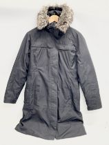 A ladies The North Face jacket. Medium.