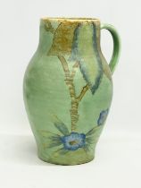 A large 1930’s Crown Devon vase with handle. 27x34cm
