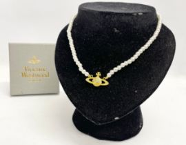A Vivienne Westwood necklace with box.