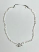 A Vivienne Westwood necklace.