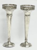 A pair of silver trumpet vases. MN&WB. Birmingham. 1936. 220.62 grams filled. 16.5cm