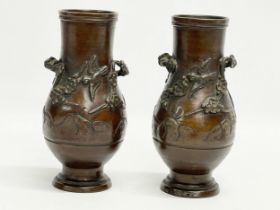A pair of late 19th century Japanese bronze vases. 20cm