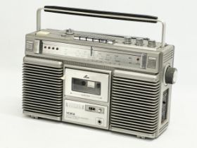 A vintage Yorx Stereo Radio Cassette player. K6060.