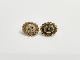 A pair of Victorian 9ct gold and diamond earrings. 1.77 grams.