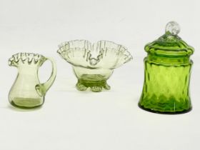 3 pieces of Victorian green Art Glass. A Victorian lidded jar 10x16cm. A Victorian frilled edge bowl