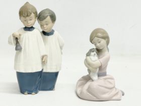 2 Nao porcelain figurines. 18cm