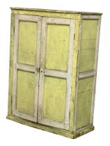 A Victorian pine 2 door cupboard with original paintwork. 93x44x130cm