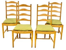 A set of 4 Ercol ‘model 823’ blonde elm dining chairs.