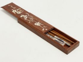 A Chinese rosewood and Mother of Pearl chopsticks and case. 26.5cm