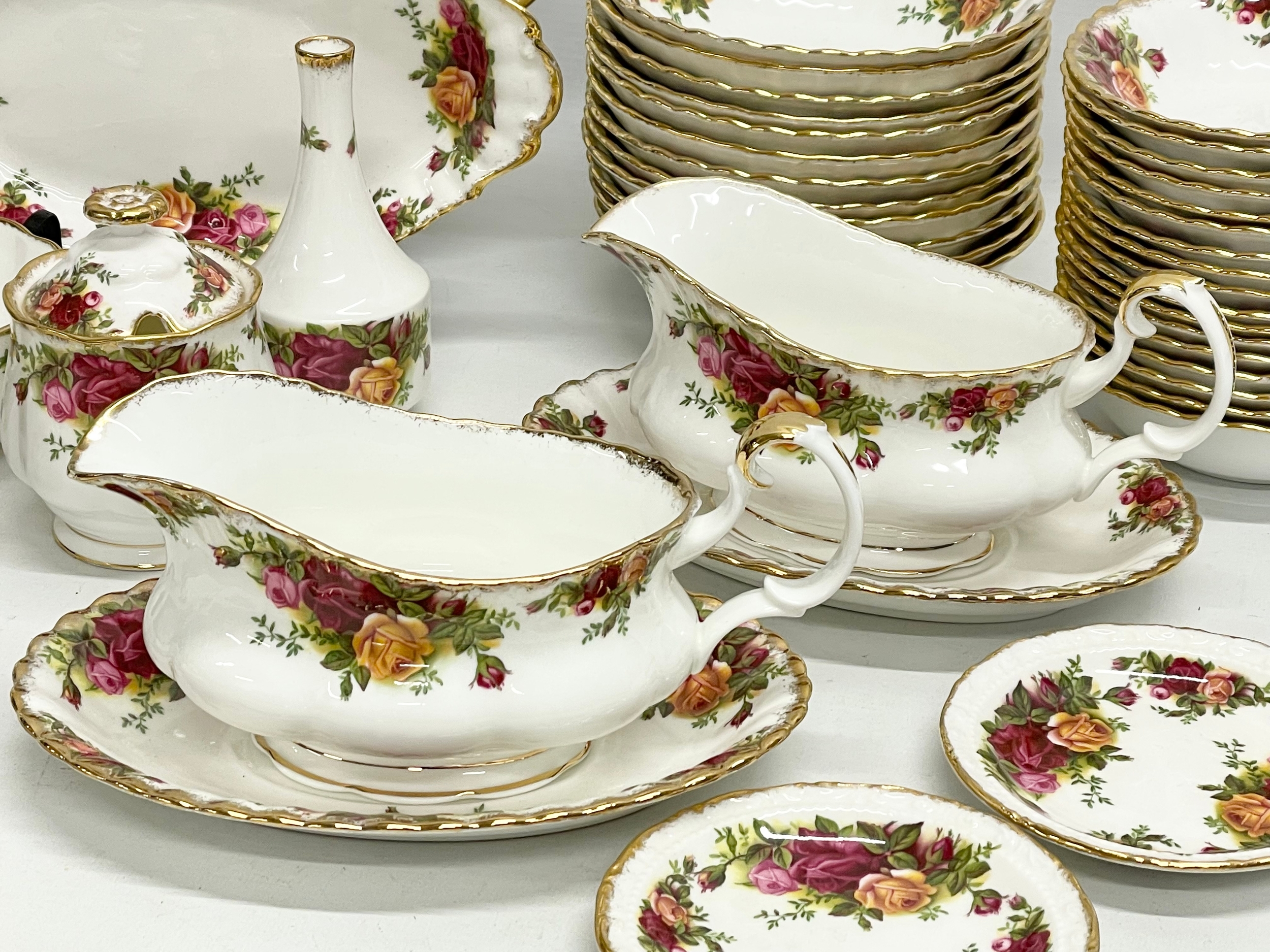 43 pieces of Royal Albert ‘Old Country Roses’ tea and dinner ware. A pair of gravy boats with - Image 5 of 8